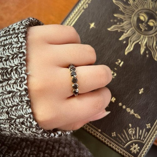 Black Diamond Shared Prong Ring